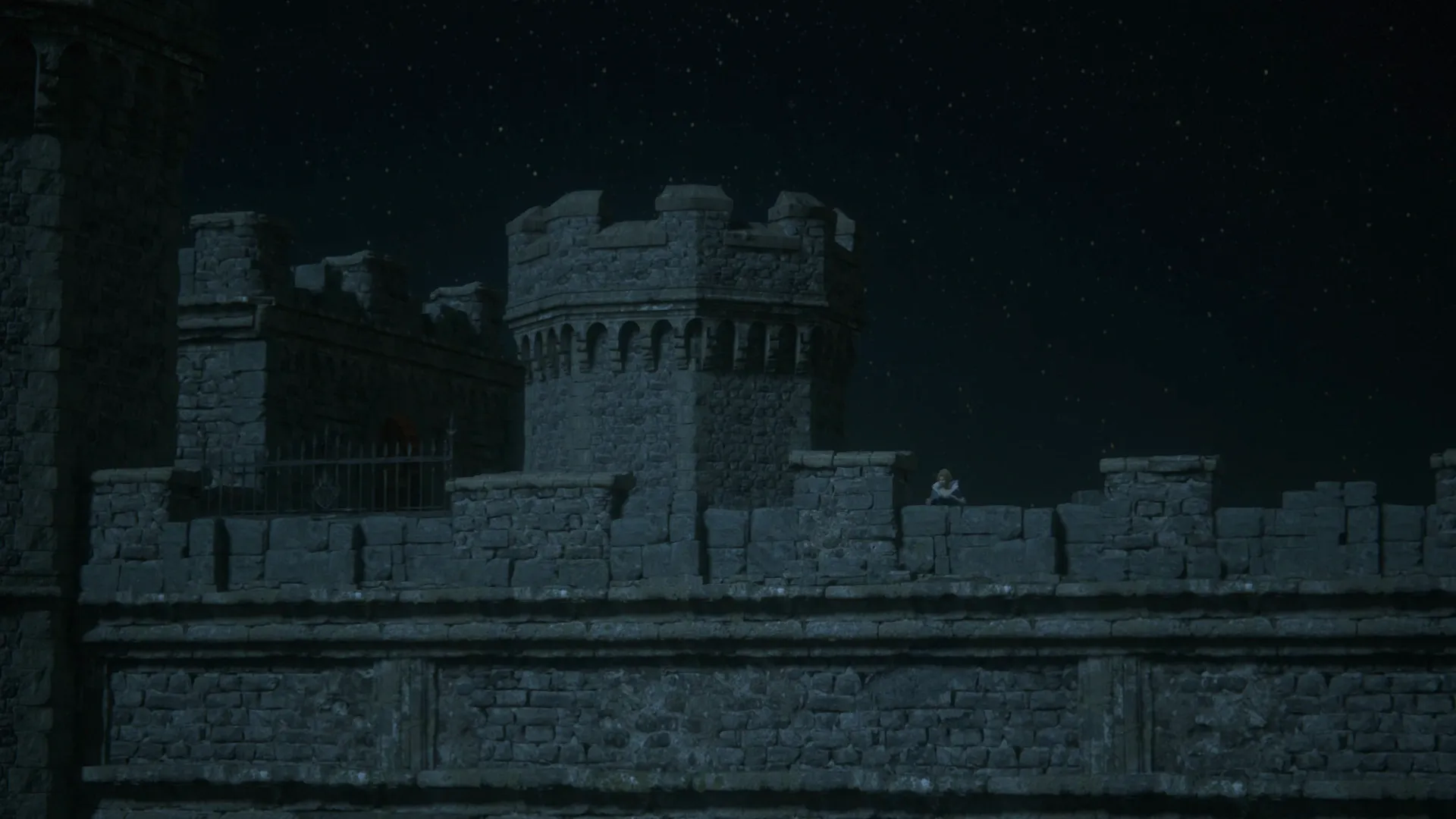 Benedikta standing behind one of the ramparts at the top of Caer Norvent