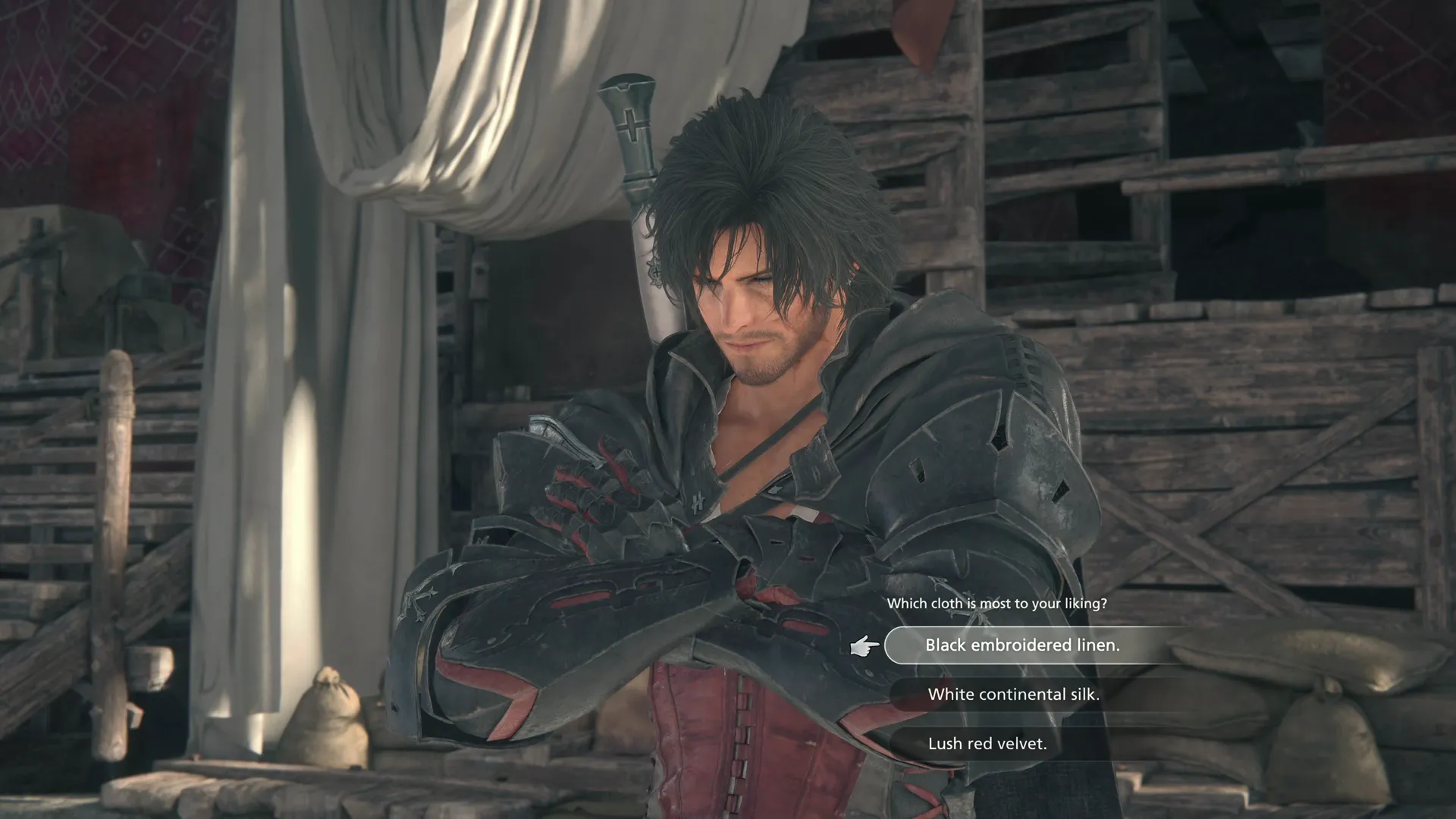 Clive choosing which color of cloth is most to his liking - black, white or red