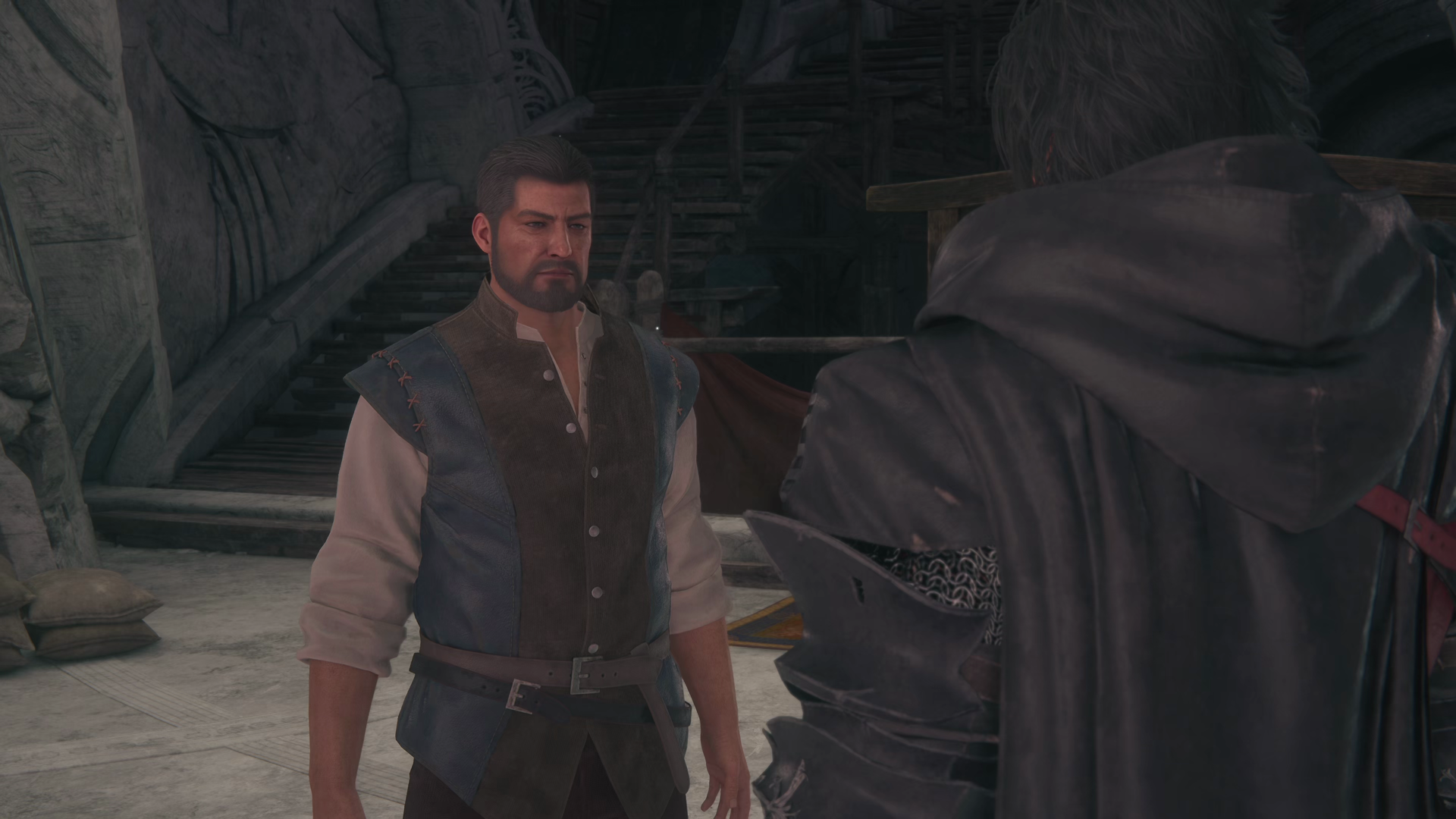Clive speaking to Otto in the mess of the Hideaway