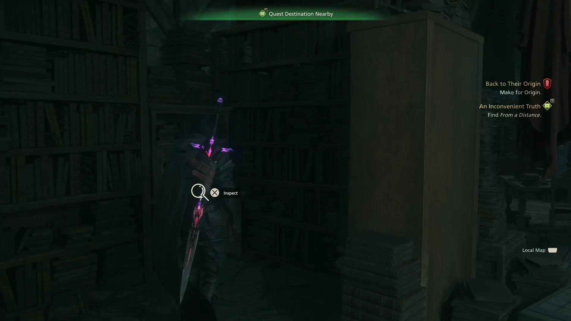 Exploring the bookshelves at the back of the house in Garric