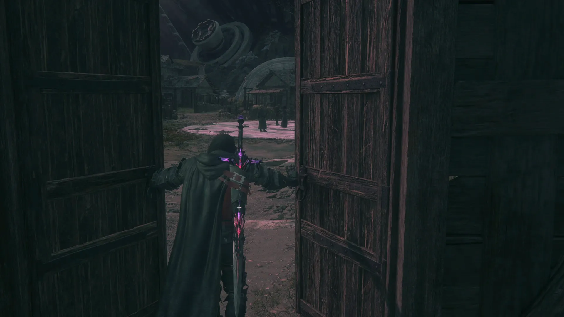 Opening the large wooden doors to enter the town of Mikkelburg