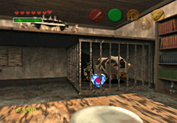 Link beside the Lon Lon Cow inside one of the houses of Kakariko Village near the Heart Piece